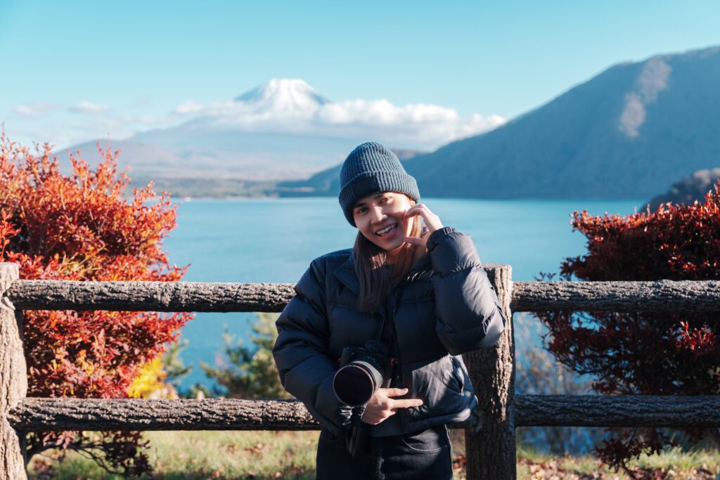 Woman,Tourist,With,Fuji,Mountain,At,Lake,Motosu,In,Autumn